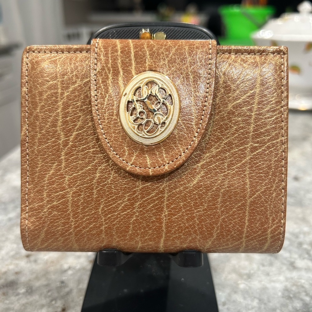 Vintage 1967 Rolf’s buffalo calf leather ladies wallet with floral decal.
